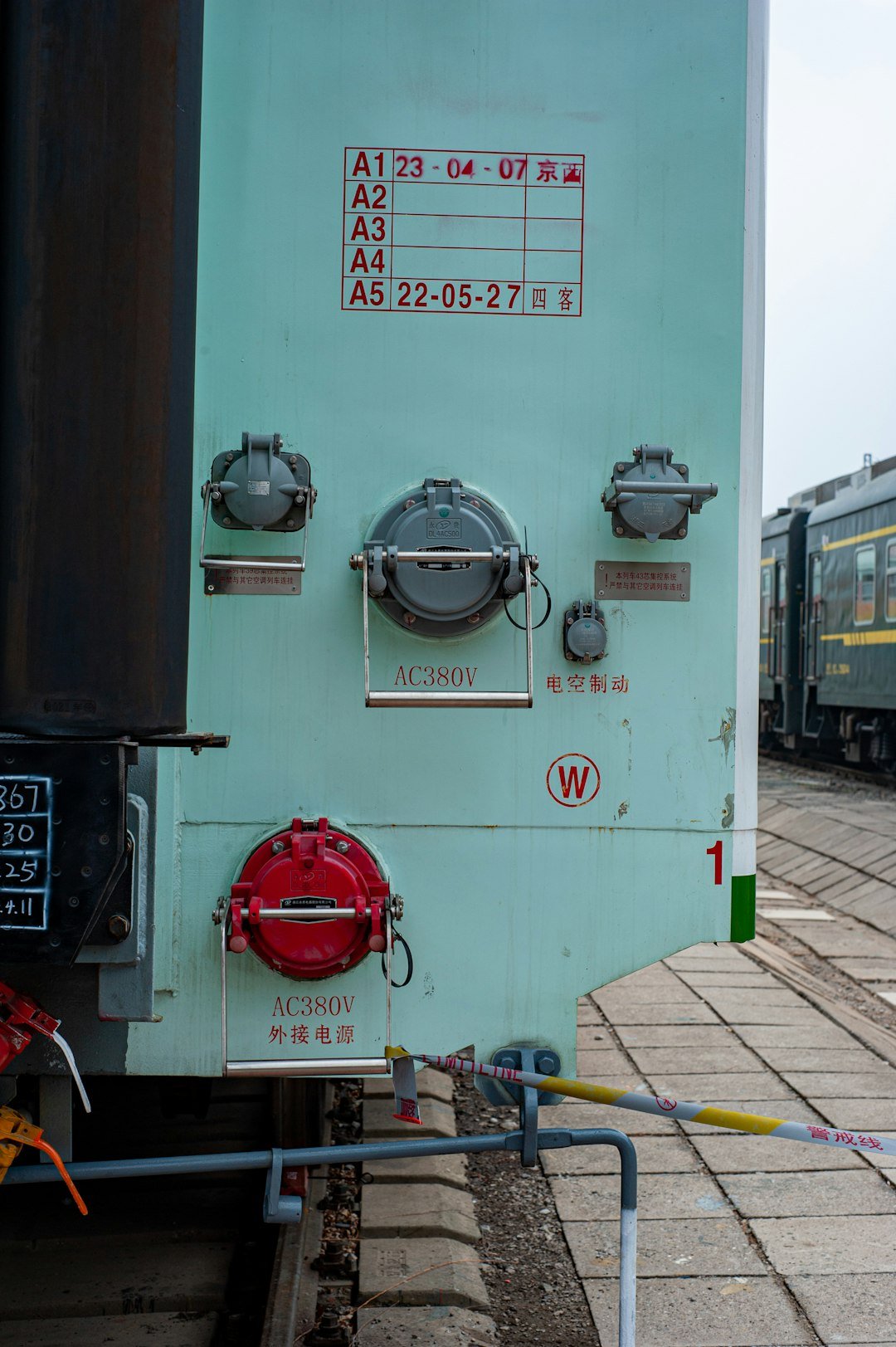 a-train-engine-sitting-next-to-a-train-station-gaovkvopg8s