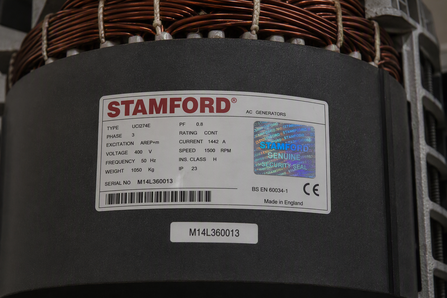 Stamford UCI274E alternator nameplate with genuine security seal and serial number